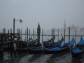 Blue gondola on Grand Canal in Venice, Italy.
